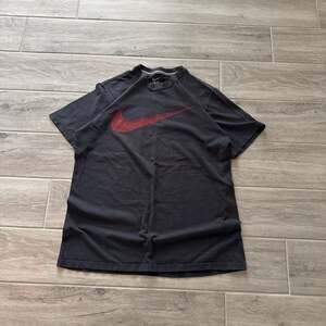 Nike Big Swoosh, Men's Fashion, Tops & Sets, Tshirts & Polo Shirts on Carousell
